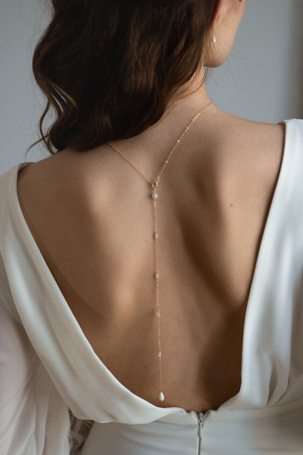 Chaîne de dos en porcelaine capucine